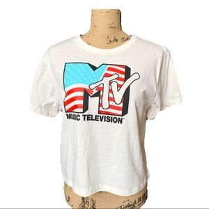 MTV New Women crop tee in a light cream color.